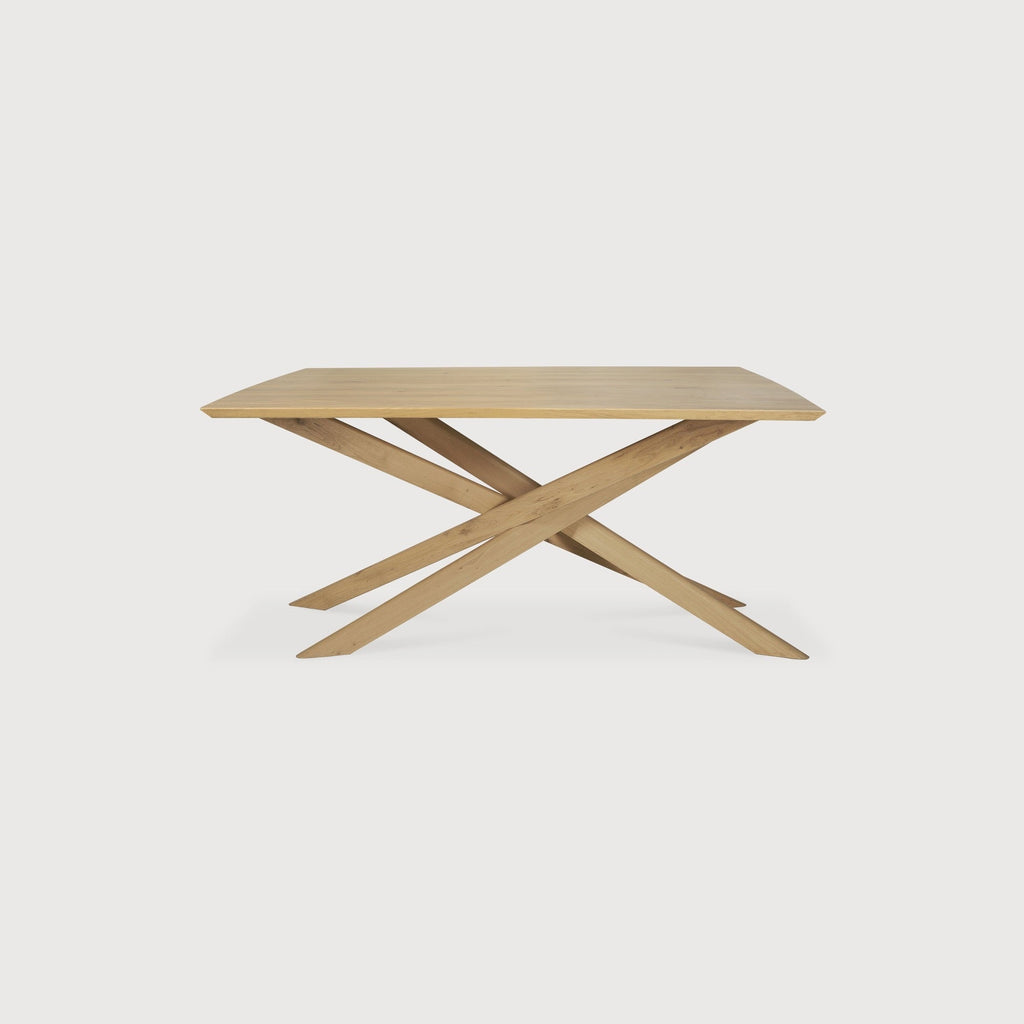 Mikado Dining Table in solid white oak with sculptural interlocking legs and oiled finish