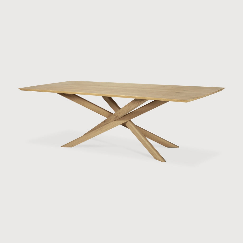 Mikado Dining Table in white oak with sculptural interlocking legs and oiled finish