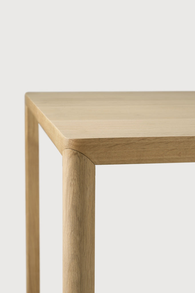 White Oak Air Dining Table detail with white background and beautiful wood detailing. - Saffron and Poe, Ethnicraft