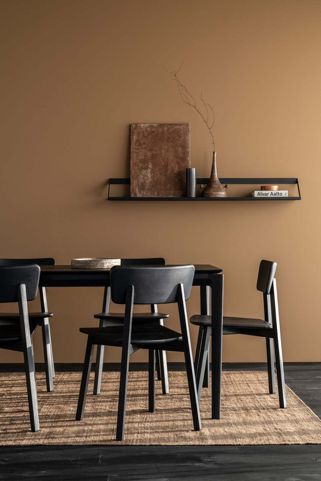 Black Oak Bok Dining Table with floating top and contoured frame in premium oak