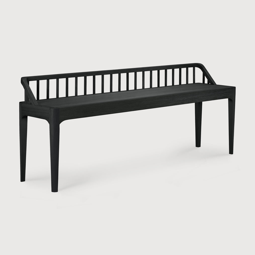 Black oak spindle bench with low spoked back and spacious seat in modern coastal style
