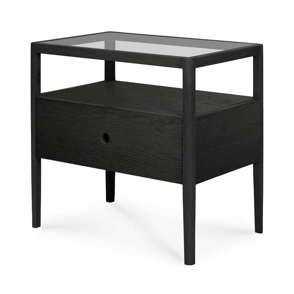 Spindle Bedside Table in black oak with glass top, drawer, and open shelf design