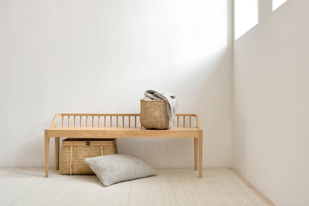Spindle bench in European white oak with low spoked back and spacious seat, coastal California design