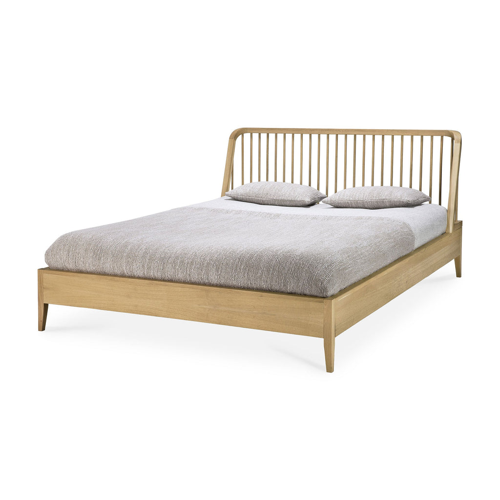 White oak Spindle Bed with classic spindle headboard and curved edges in coastal California style