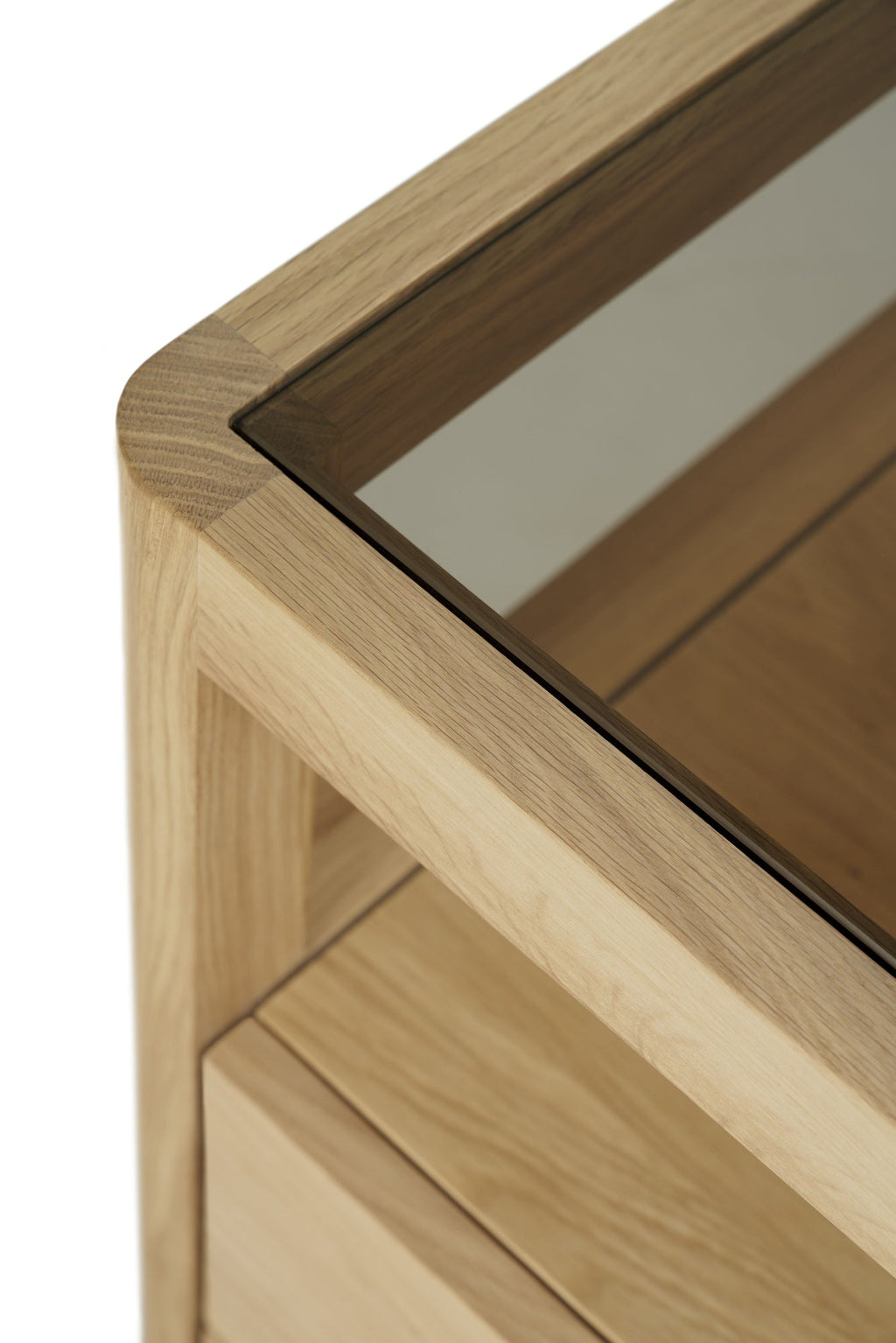 Oak Spindle Dresser with sleek lines, four drawers, open shelf, and glass top in European white oak