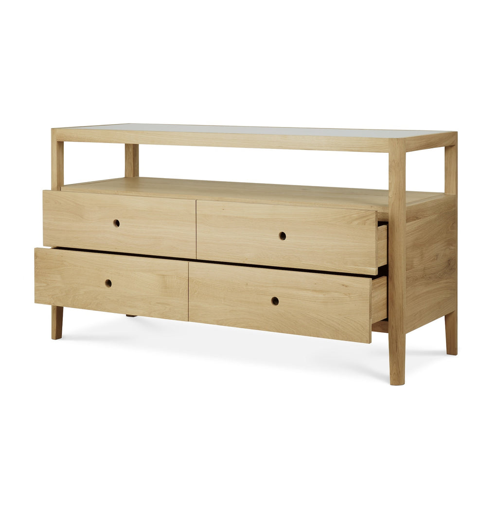 Oak Spindle Dresser with four drawers, open shelf, and glass top in coastal modern style