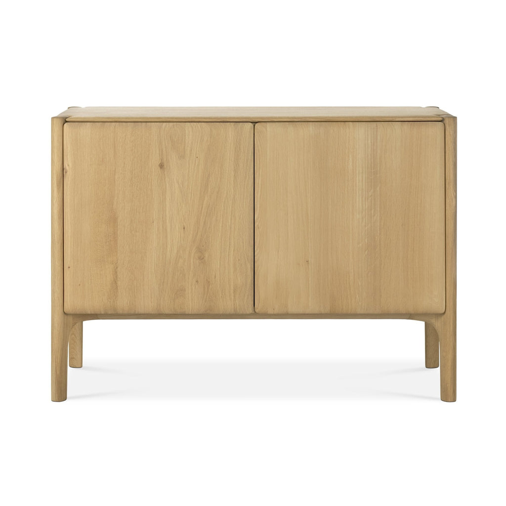 PI 2-Door Console in white oak with curved edges and sculpted base, modern organic finish, and practical storage.
