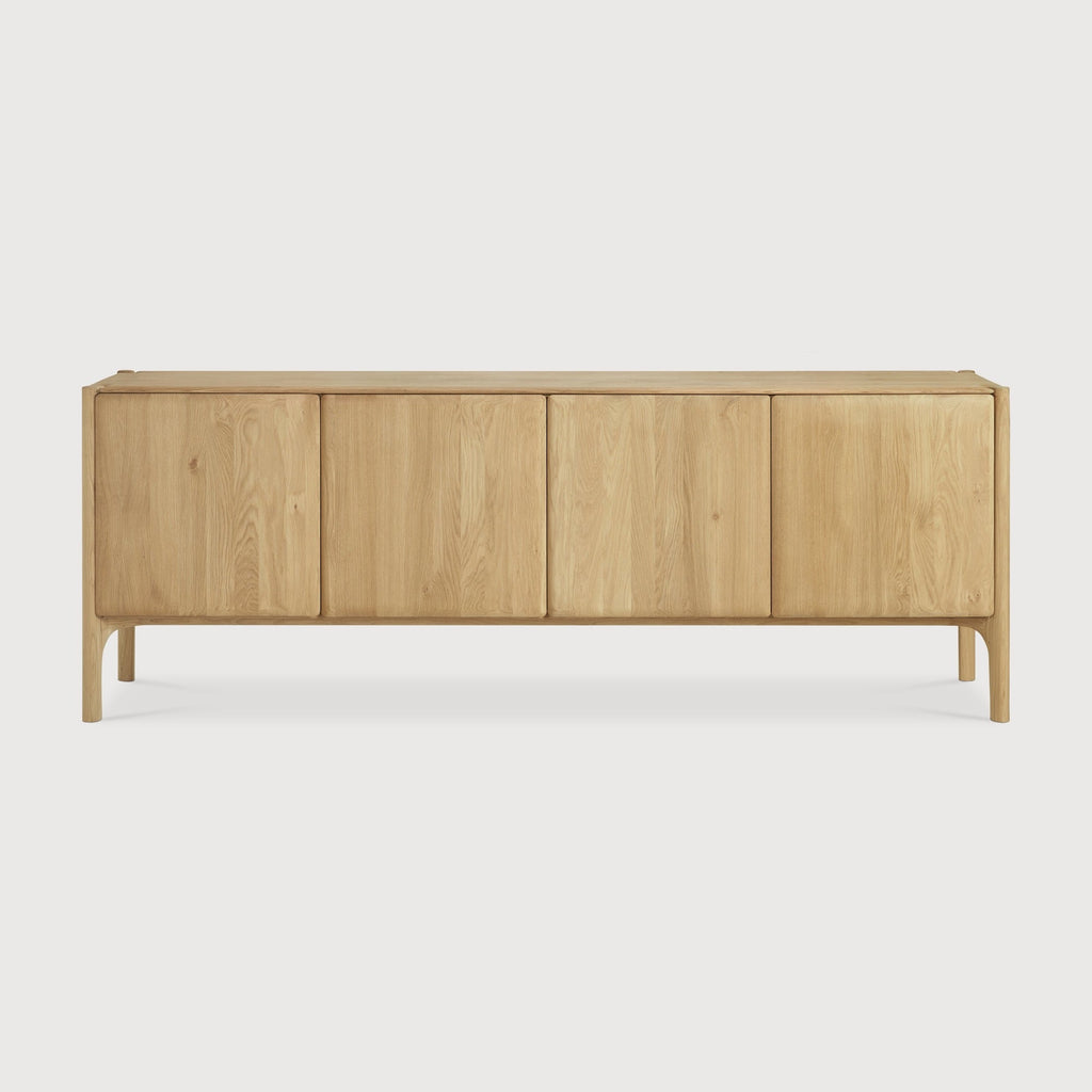 PI Sideboard in white oak with sculpted base and curved edges, modern organic finish, practical storage.