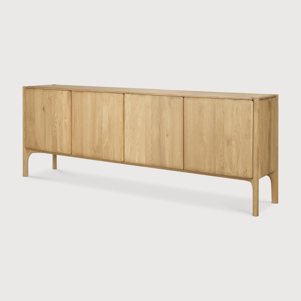 PI Sideboard in white oak with sculpted base and curved edges, modern silhouette and polished finish for storage and style
