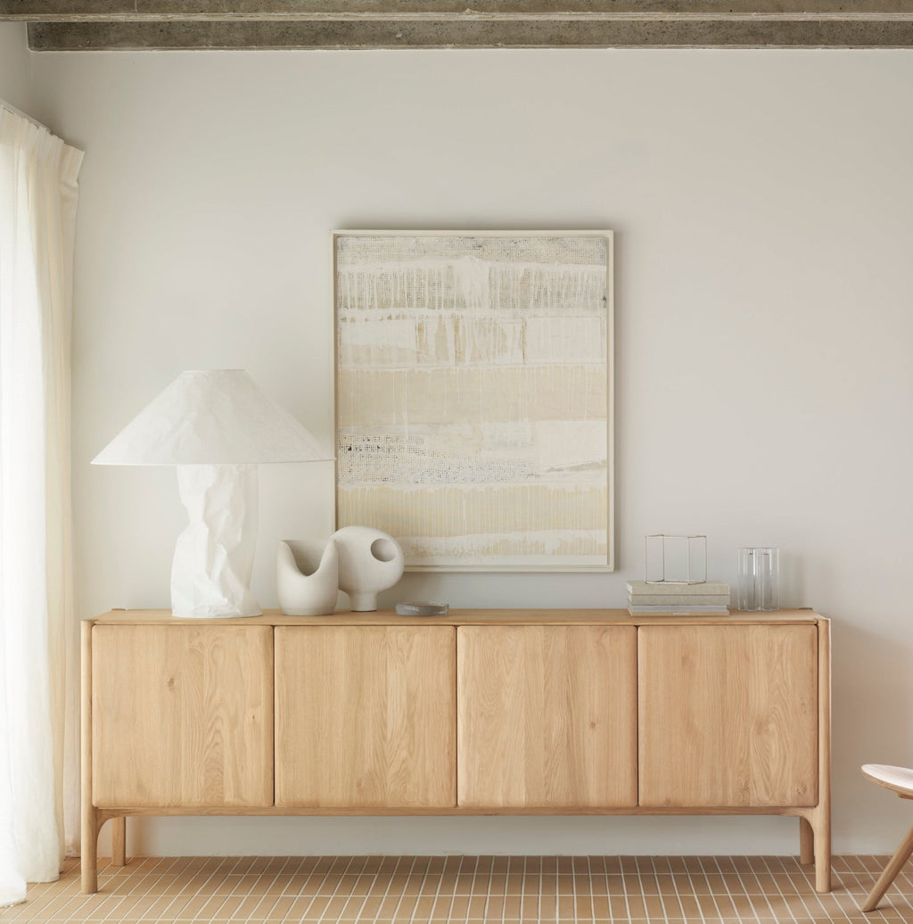PI Sideboard in white oak with sculpted base and curved edges, modern silhouette and practical storage