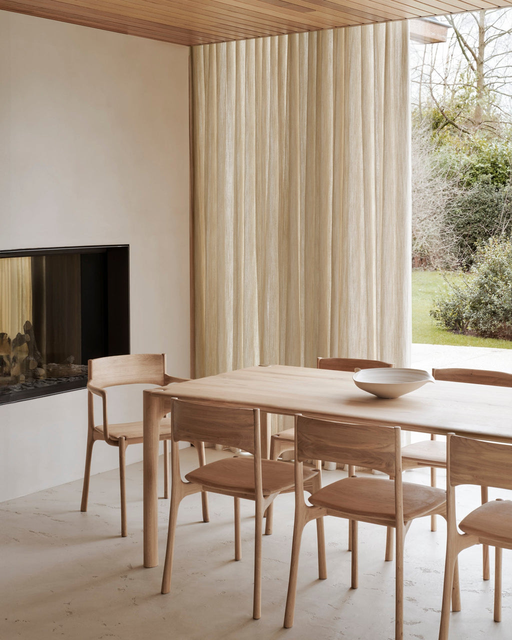 PI Dining Table in white oak with sculpted base and curved edges, polished organic finish