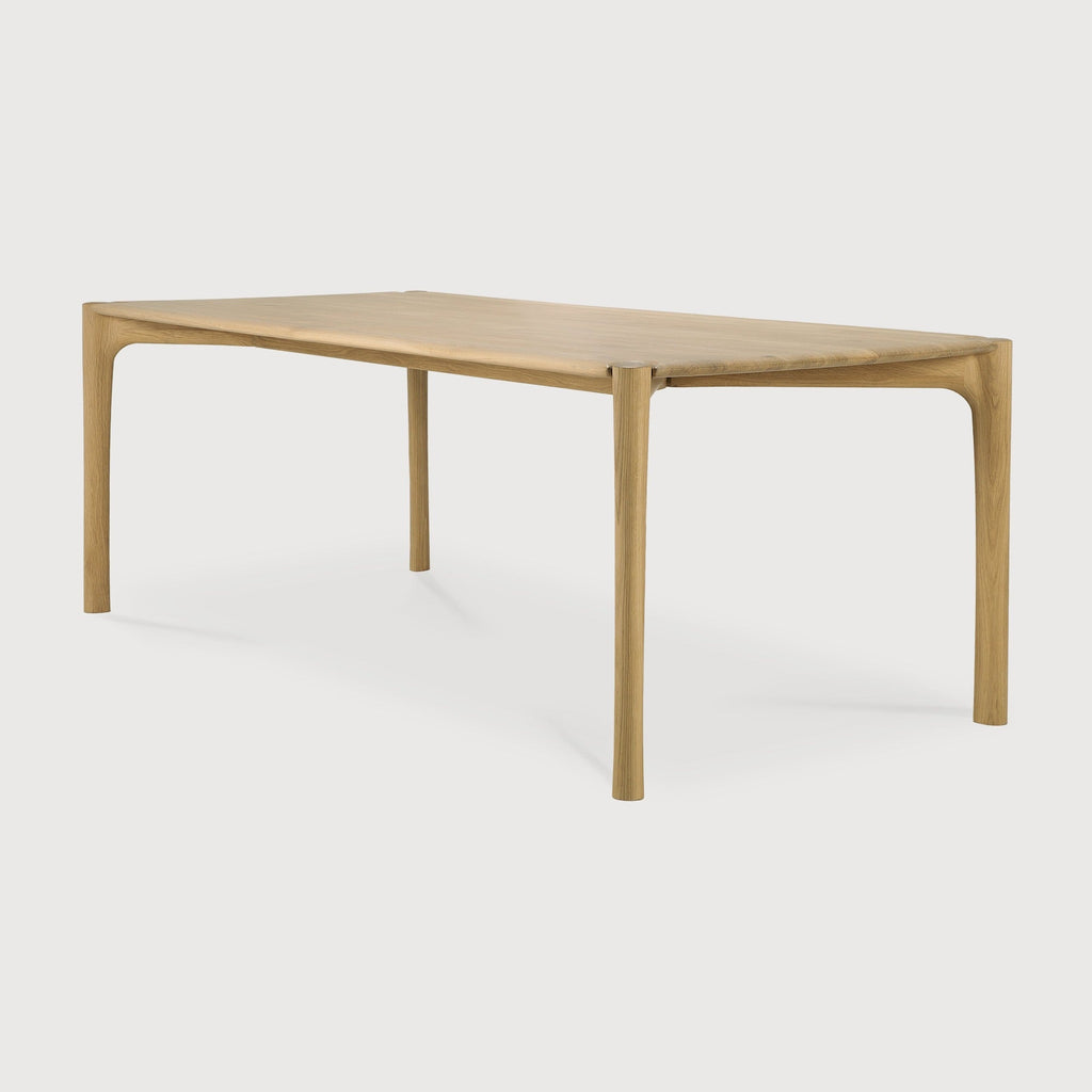 PI Dining Table in white oak with sculpted base and curved edges, modern design with polished finish