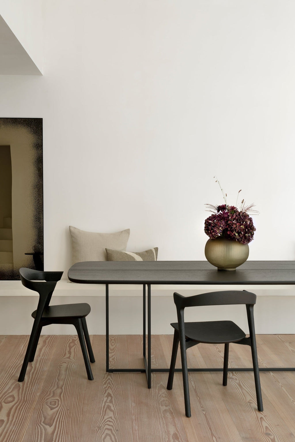 Bok Dining Chair in black varnished oak with contoured frame and timeless design