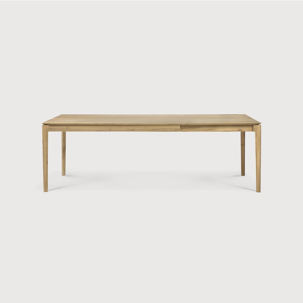 Bok Extendable Dining Table in White Oak with contoured frame and floating top