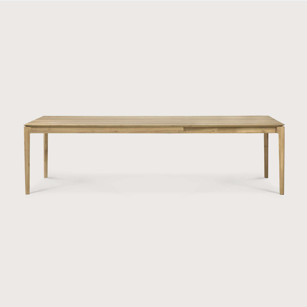 Bok Extendable Dining Table in White Oak with floating top and contoured frame