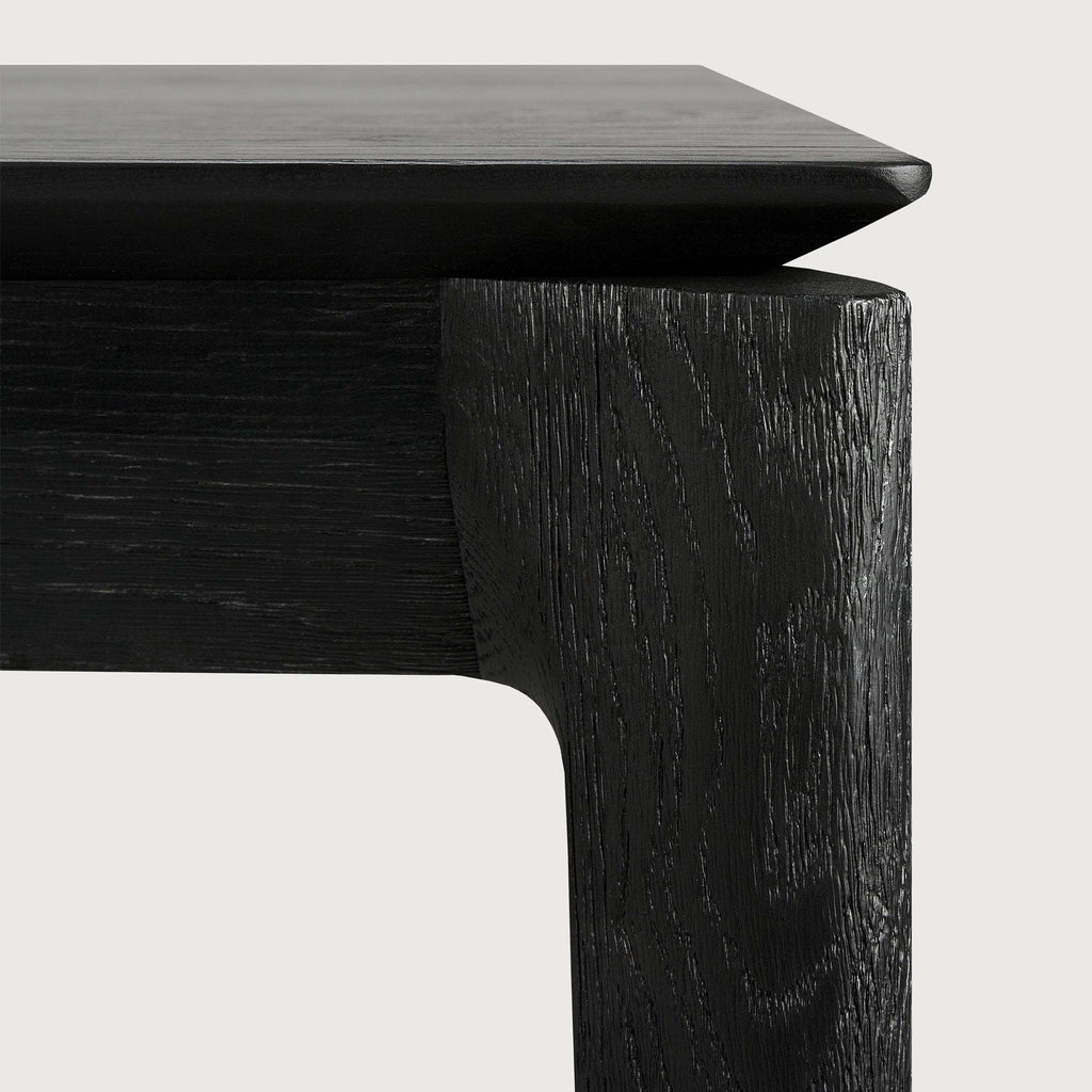 Black Oak Bok Dining Table with floating top and contoured frame in solid oak finish