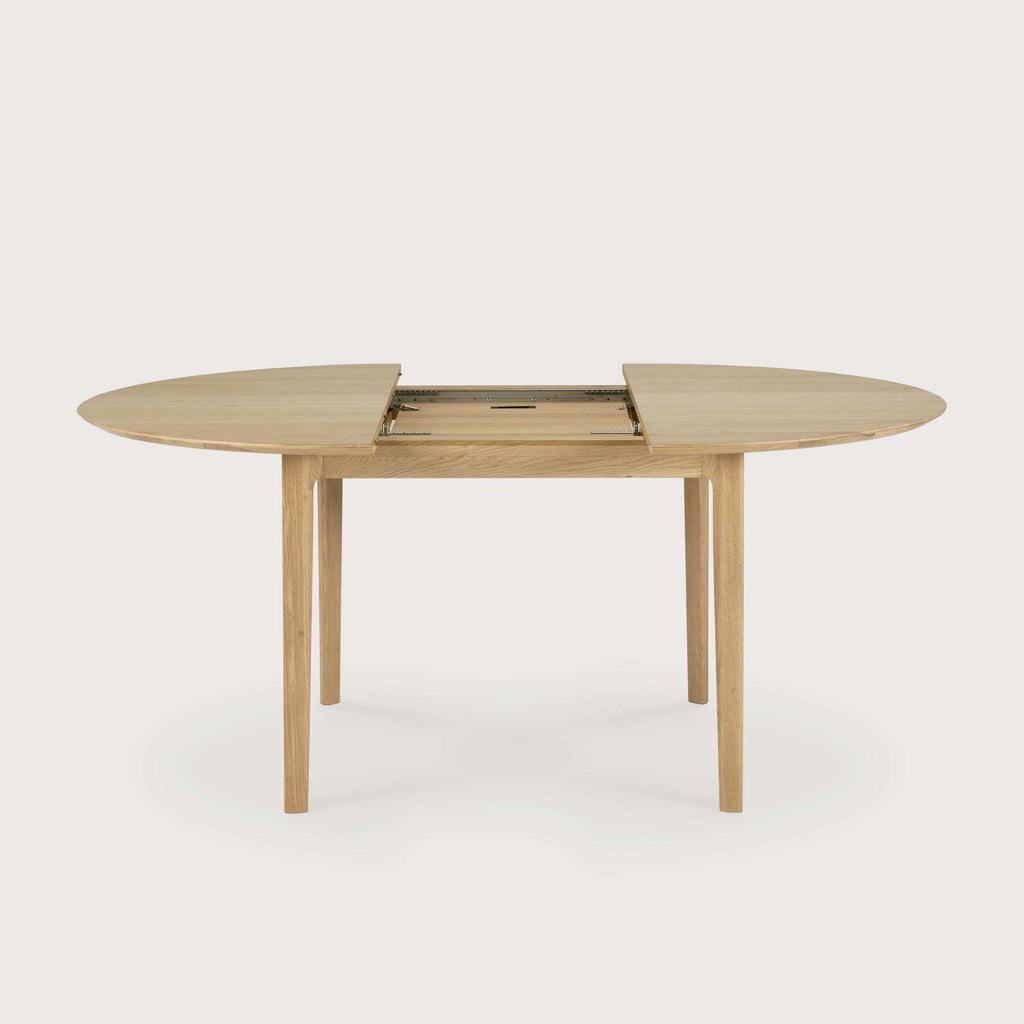 Bok Extendable Round Dining Table in white oak with floating top and contoured frame