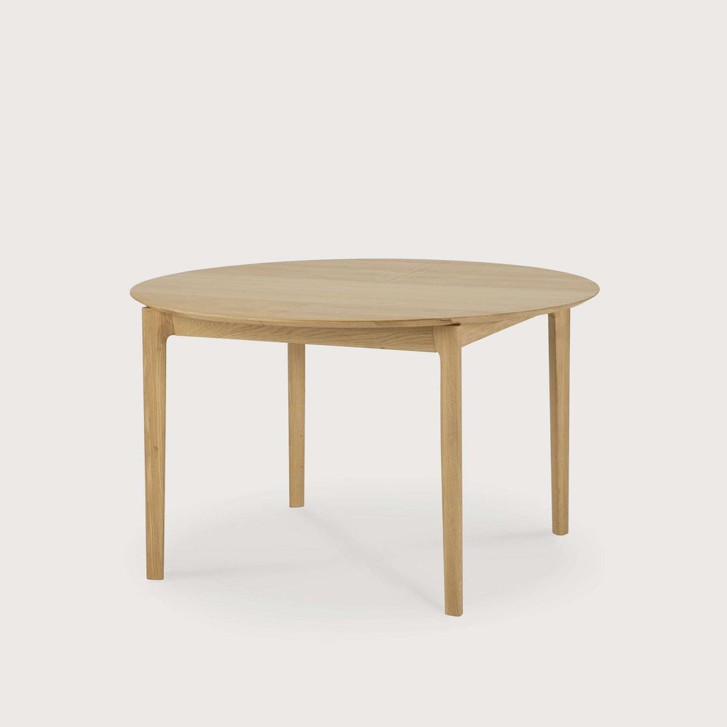Bok Extendable Round Dining Table in white oak with floating top and contoured frame