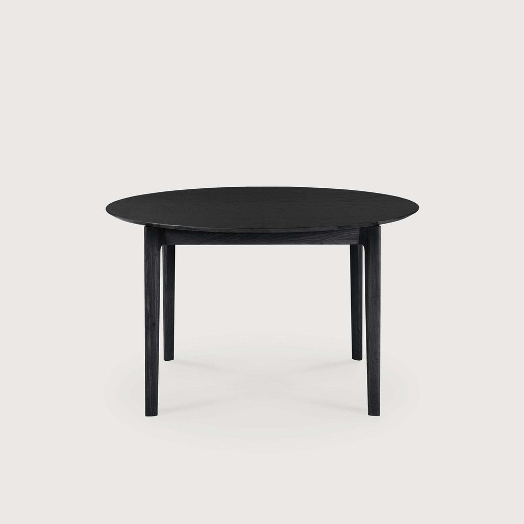 Bok Extendable Round Dining Table in black oak with floating top and solid oak construction