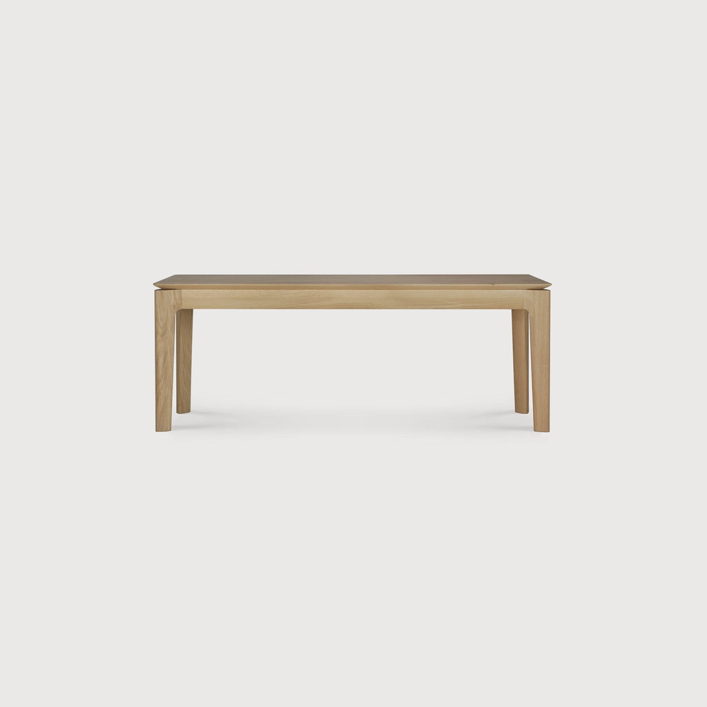Bok Bench in white oak with contoured frame and floating top, crafted from solid European white oak with oiled finish