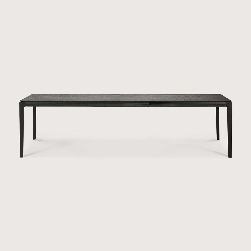Bok Extendable Dining Table in black oak with floating top and solid oak frame