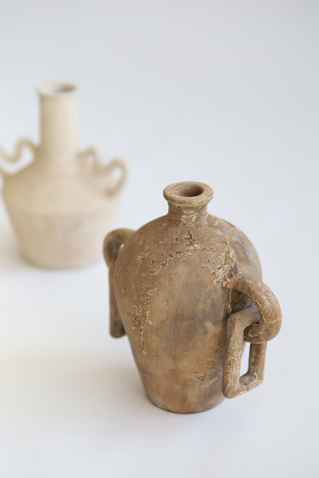 Handcrafted Indah Vessel with natural earthy tones and vintage terracotta finish from Indonesia