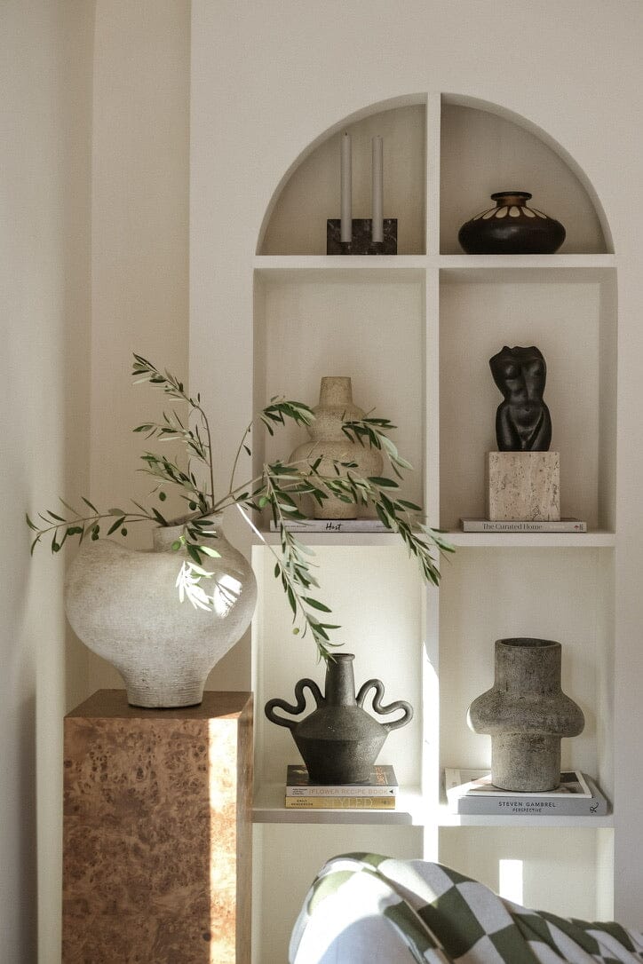 Stylish organic-hued terracotta Goa vessel inspired by Goa Gajah temple entrance, handcrafted by Indonesian artisans with vintage finish