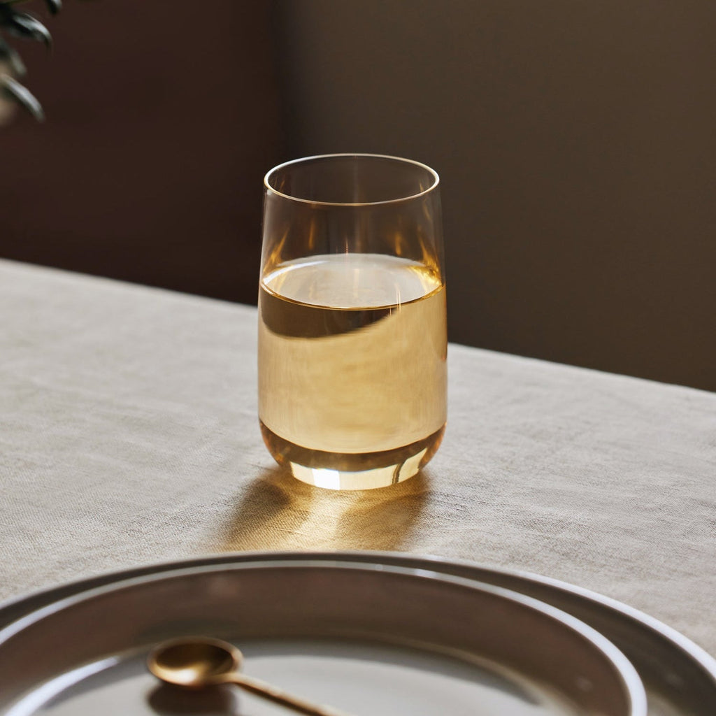 Set of 4 tall Cremini tumblers made of durable borosilicate glass, 11 oz capacity.