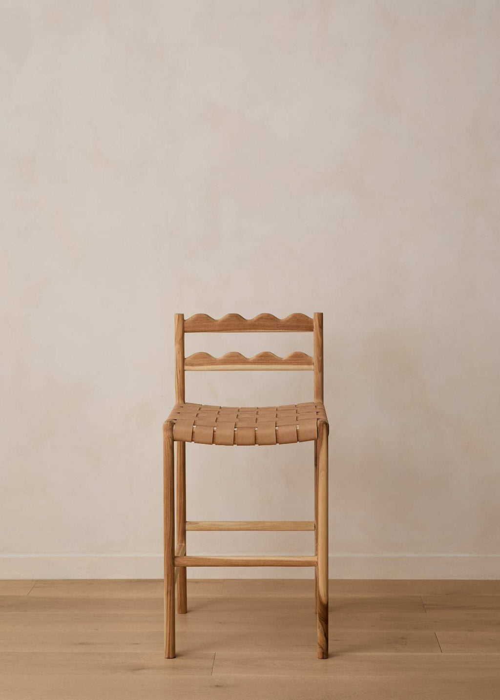Aegean Scalloped Counter Stool with scalloped teak wood backrest and woven leather seat