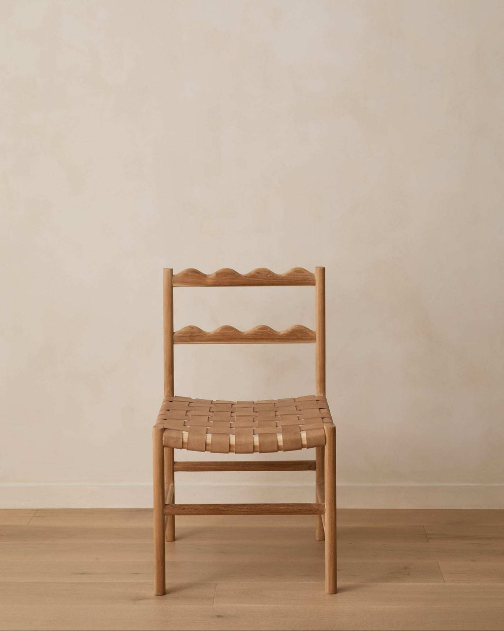Aegean Scalloped Dining Chair handcrafted from solid teak wood with woven leather seat and scalloped backrest