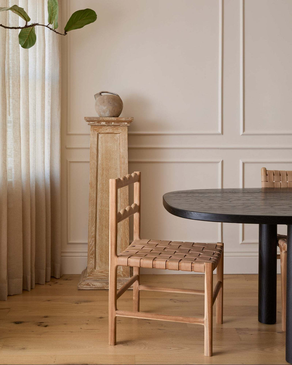 Aegean Scalloped Dining Chair handcrafted from teak wood with scalloped backrest and woven leather seat