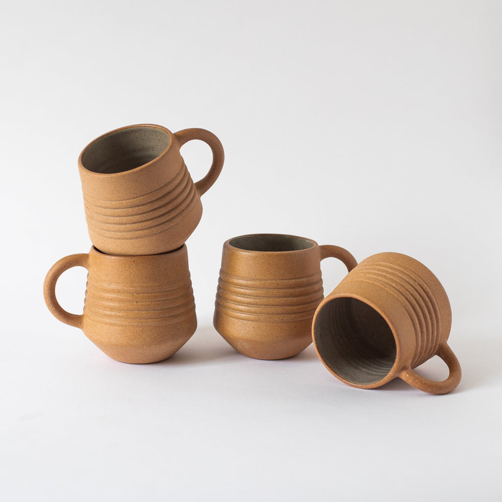 Handcrafted Anillo Mug ceramic cup with earth tone clay texture, glazed inside, 9.5 oz capacity