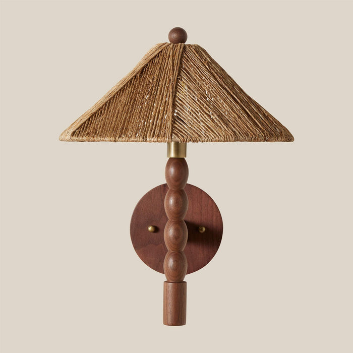 Wooden Alhambra wall sconce with a textured brown shade on a beige background