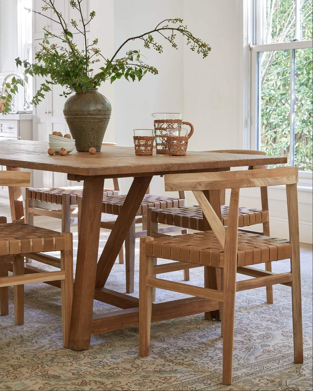Woven Leather Wishbone Chair with hand-carved teak frame and beige woven leather seat, second quality dining chair with natural wood grain and leather variations
