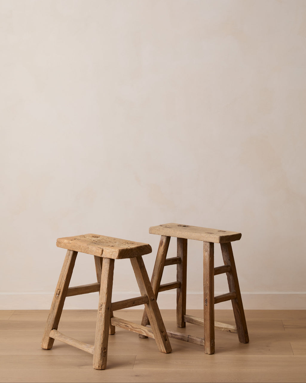 Antique elmwood stool handcrafted with mortise and tenon joinery, showing vintage patina and rustic charm from Shandong Province China