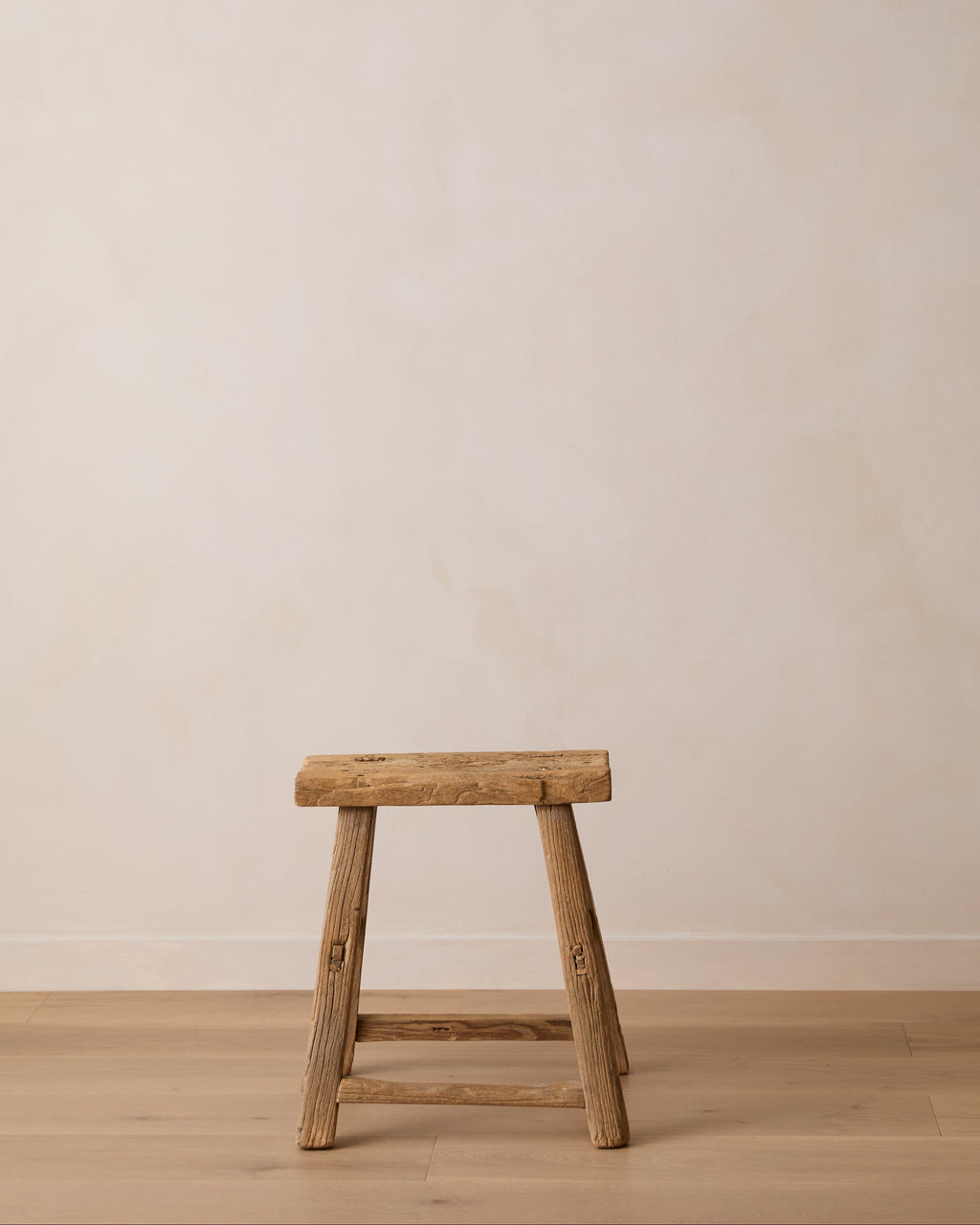 Vintage handcrafted elmwood antique stool with rich patina and traditional joinery from Shandong, China
