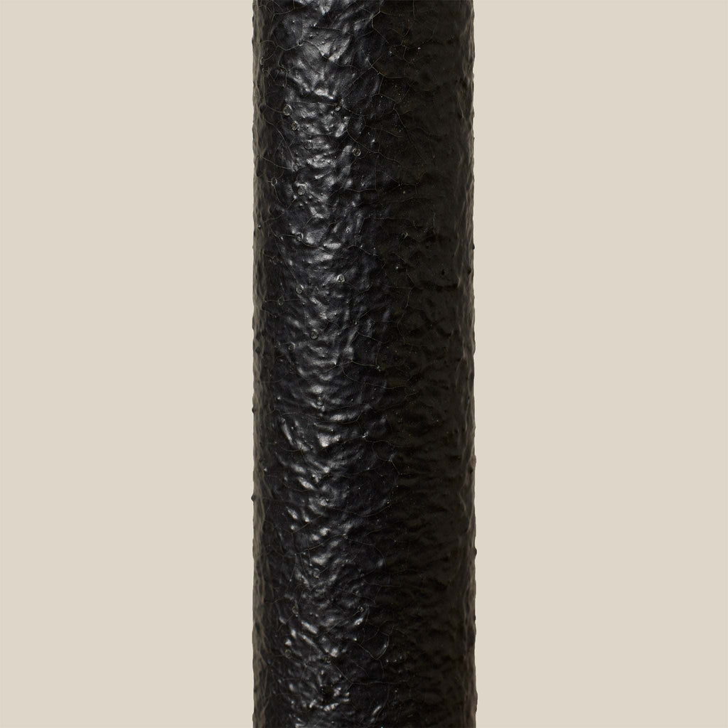 Close-up of a textured Bainbridge lamp base on a beige background