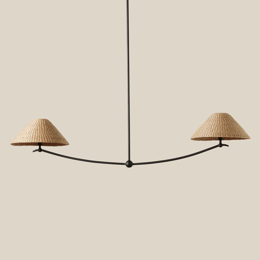 Modern Bainbridge liner pendant light with wicker lampshades on a neutral background