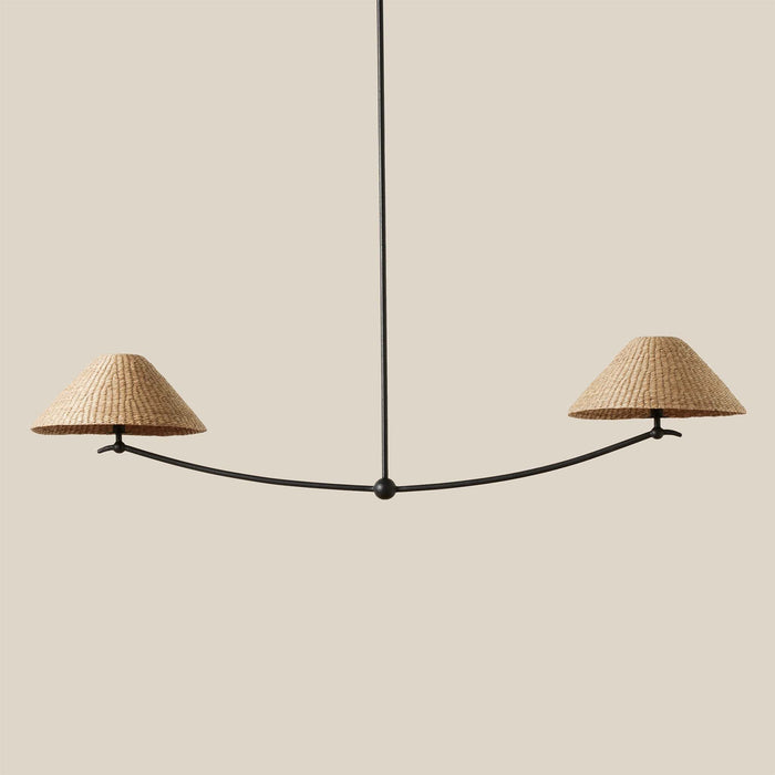 Modern Bainbridge liner pendant light with wicker lampshades on a neutral background