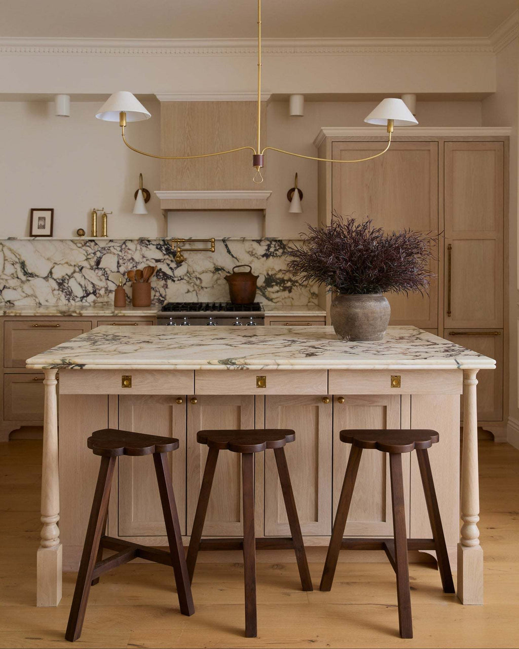 Cloud Counter Stool handcrafted from walnut wood with cloud-shaped seat and sculptural design