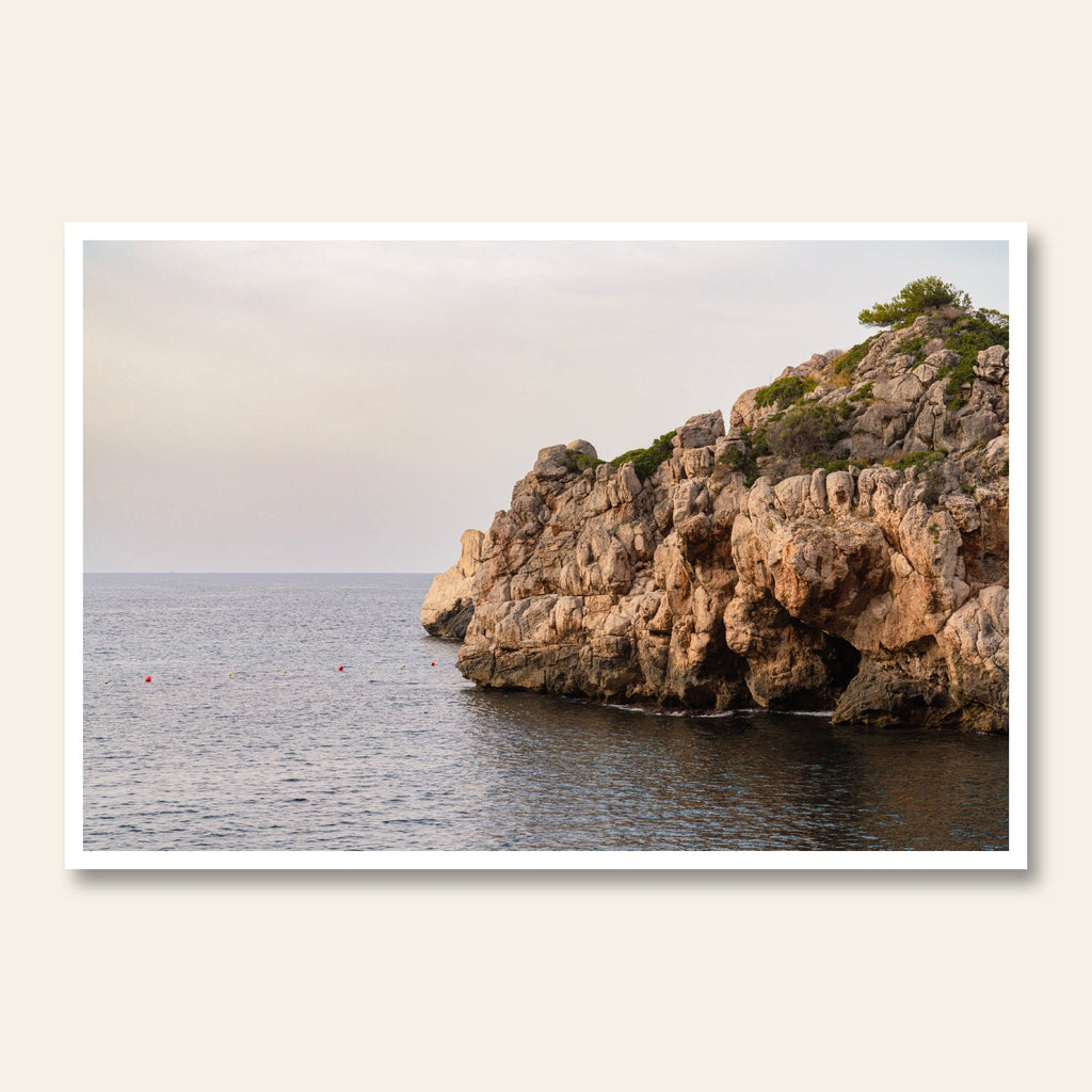 Dramatic coastal rock formation in Mallorca showcasing natural beauty titled Coastal Colossus