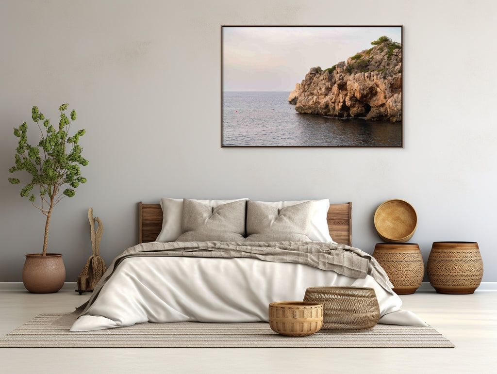 Photo of rocky cliffs at oceans edge in room by Mika Street for Saffron and Poe