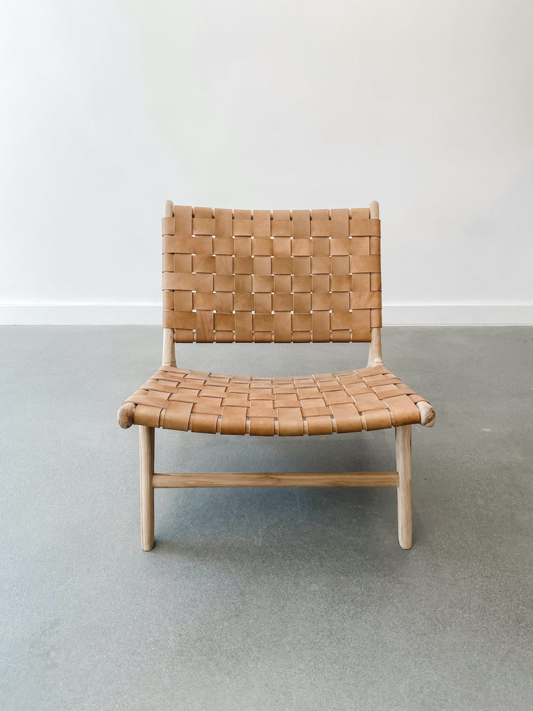 Front view of Woven Leather Strap Lounge Chair in Beige against white background. Teak wood and leather straps. Handcrafted in Bali. - Saffron and Poe