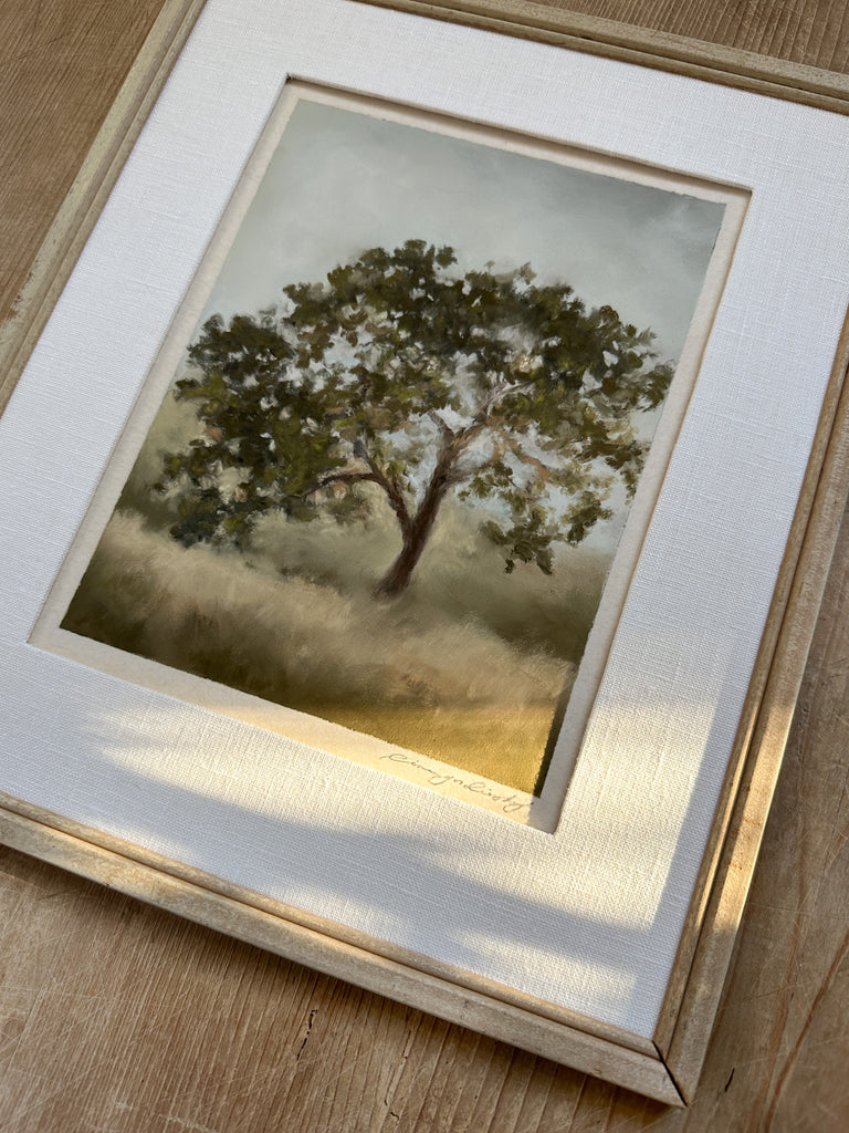 Oak tree pastel artwork in white linen matting and vintage framing at angle on table. - Saffron and Poe, Line Gordievsky