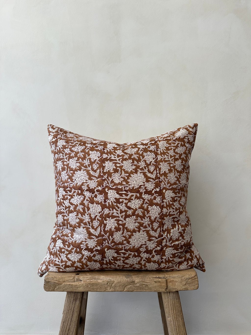 Indian Blockprint Pillow on sofa with neutral hand-block-printed linen design