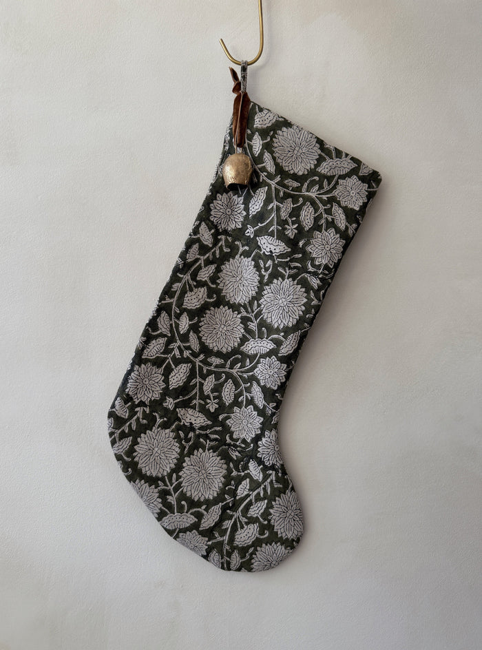 Indian Block Print stocking with floral pattern and bell on a white background - Saffron + Poe