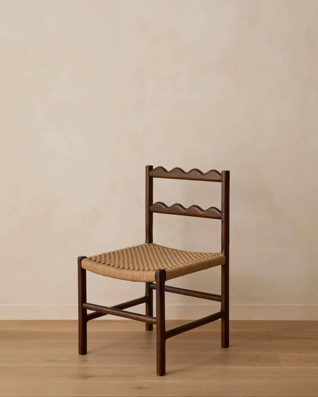 Ionian Scalloped Dining Chair in dark walnut teak with handwoven paper cord seat