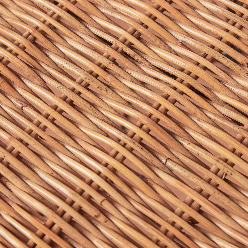 Close-up detail of Lacoste woven rattan pattern.