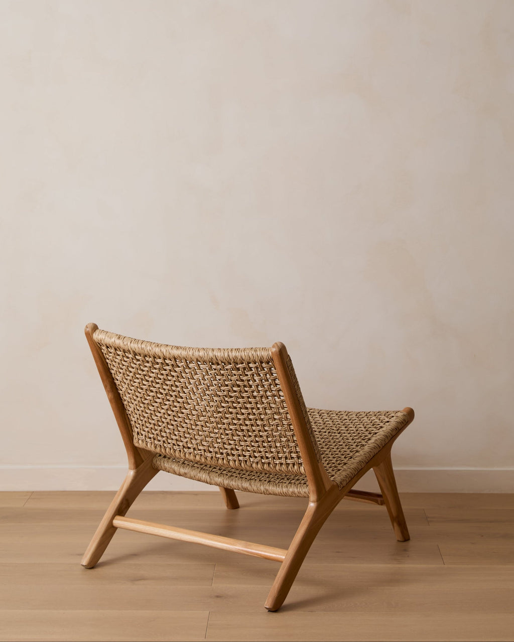 Marin Lounge Chair with teak frame and weatherproof faux rattan weave, handcrafted in Bali, second quality with minor imperfections