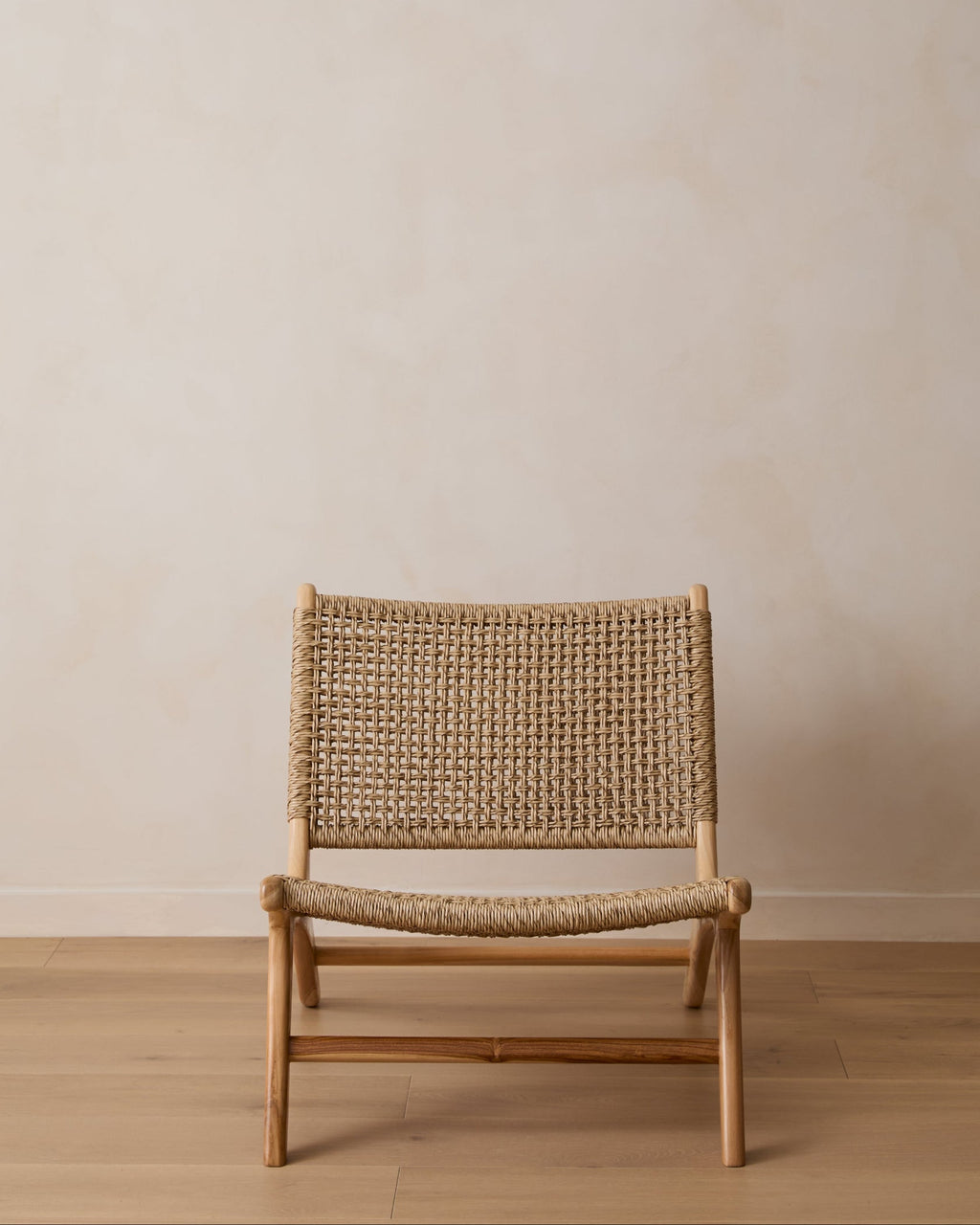 Weatherproof Marin Lounge Chair with teak frame and faux rattan weave, second quality sale